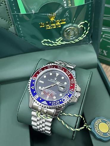 Наручные часы: Rolex GMT‑Master II “Pepsi” saatı - Model: Rolex Oyster Perpetual — 1