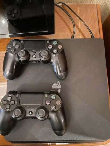 ucuz playstation 5: Playstation 4 Slim 1TB oyun konsolu. Hec bir problem yoxdu giymeti