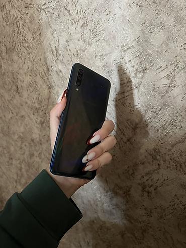 4 sim: Samsung Galaxy A50, 64 GB, rəng - Mavi, Barmaq izi — 1