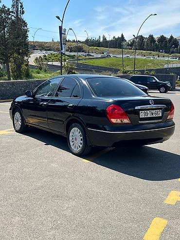 mini canta: Nissan Sunny: 1.6 l | 2006 il Sedan — 5