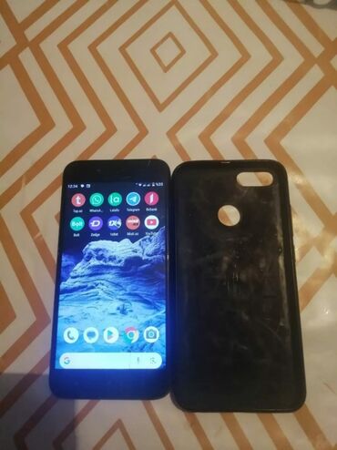 telefon mi: Xiaomi Mi A1, 64 ГБ, цвет - Черный, 
 Отпечаток пальца