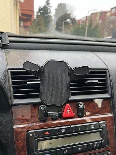 zaslonka nedir: Avtomobil üçün hava çıxışına taxılan telefon tutacağı. Stokda cəmi — 4