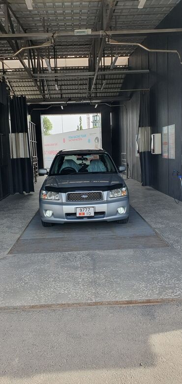 у вас машина: Subaru Forester: 2003 г., 2 л, Автомат, Бензин
