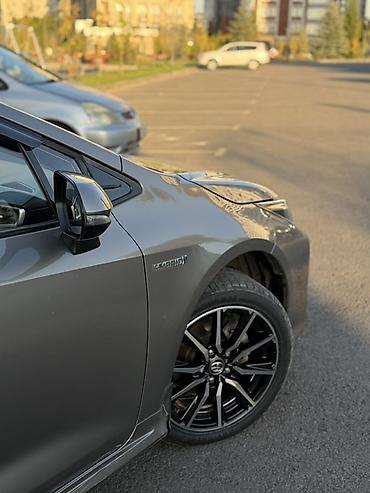 byd e9 1: Toyota Corolla: 2019 г., 1.8 л, Вариатор, Гибрид, Седан — 6