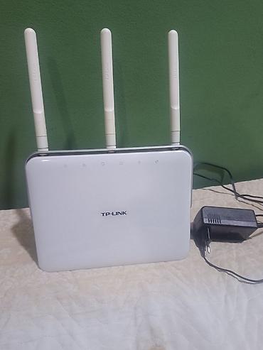 redmi pad 5: TP-LINK Archer C8 modem/router satılır. - 1 ədəd WAN/LAN port - 3 ədəd — 1