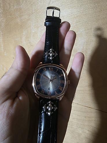 Аксессуары: "Cartier" qol saatı. Yenidir. Cəmi 9 manata. Əla saatdır. Dəyərindən — 2