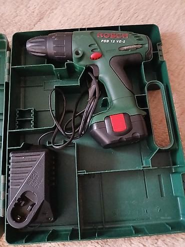rucni nosko: Bosch PSB 12 VE-2 akumulatorska bušilica/odvijač u koferu. - Napon — 1