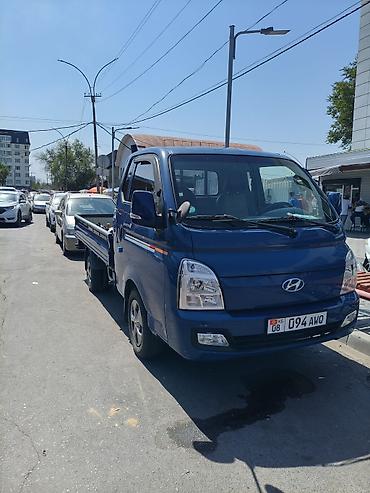 h 100: Hyundai Porter II (бортовой малотоннажный грузовик), синий цвет. - — 5
