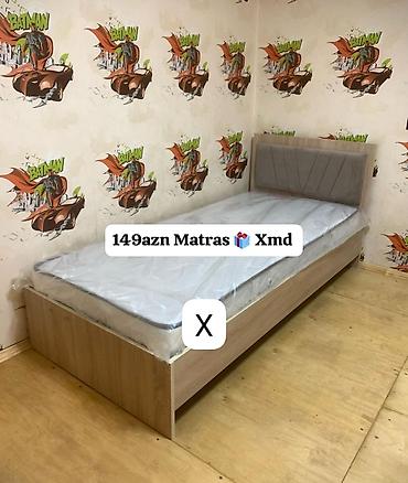 Tək nəfərlik yataq dəsti – taxta karkaslı çarpayı və üzərində matras
