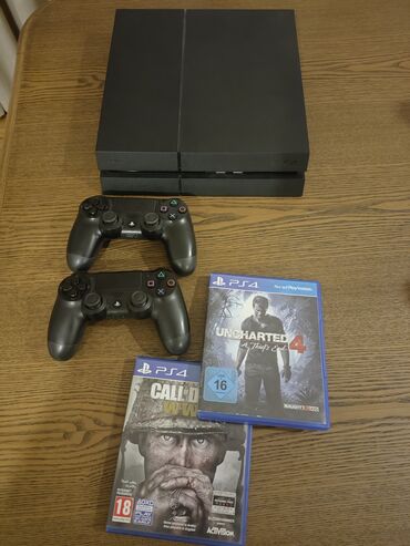 ps plus extra: PS 4 Fat model 1TB + 2 original Joystick və 2 disk (Uncharted, COD
