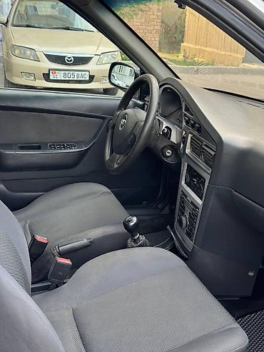 e5 olom: Daewoo Nexia: 2011 г., 1.5 л, Механика, Бензин, Седан — 8
