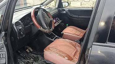 masin suseleri: Opel Zafira: 2 l | 2000 il 375308 km Van/Minivan — 4