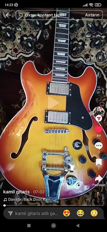 gibson gitara: Yarım-akustik elektrik gitara – sunburst rəngli, ES-335 tipli korpus — 1