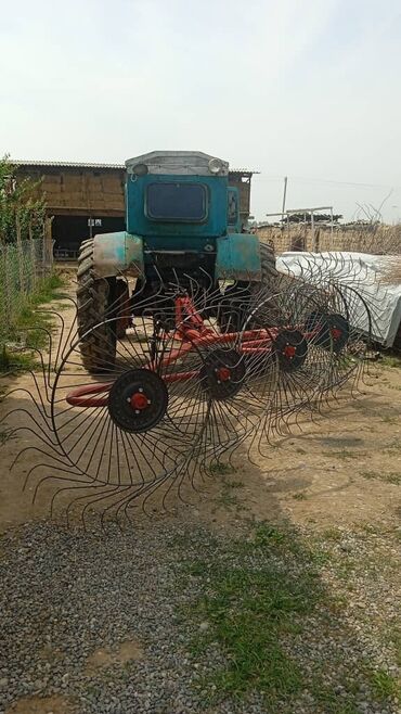 скутеры новые: Трактор с навесными граблями-ворошилками (колесно-пальцевые)