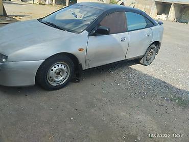 Mazda 323: 1996 г., 1.5 л, Механика, Бензин, Лифтбек — 4