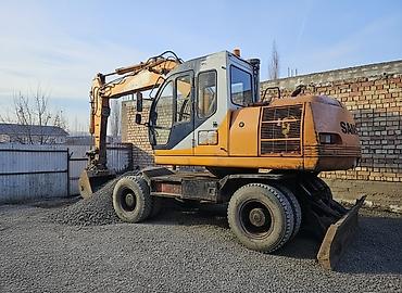 Экскаваторы: Экскаватор, Samsung, 1998 г., Колесный — 3