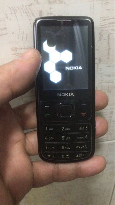 telefon blackberry: Nokia 6700 Slide, rəng - Qara, Düyməli, Sensor