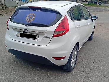 nolyeddi şəkilləri: Ford Fiesta: 1.4 l | 2009 il 255 km Hetçbek — 5