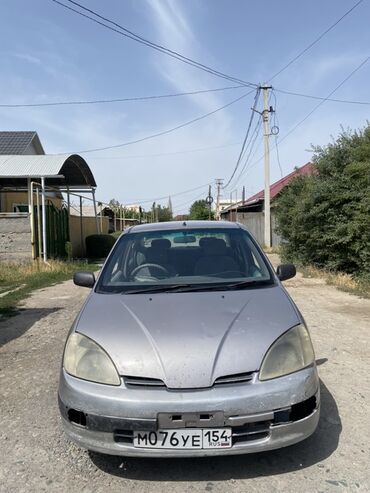 камаро шевроле: Автомобиль Toyota Platz серебристого цвета. Компактный седан, удобный
