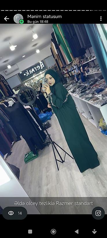 abaya: Təsviri: Tünd yaşıl rəngdə uzun hicablı paltar (abaya) – rahat, axıcı — 1