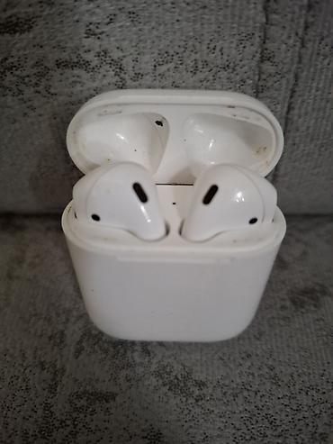 nauşniklər: Məhsul: Apple AirPods (2-ci nəsil) simsiz qulaqlıq və şarj futlyarı — 2