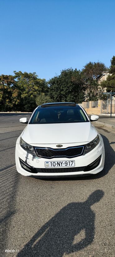Kia Optima: 2.4 л | 2010 г. Седан