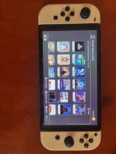 Nintendo Switch: Nintendo Switch OLED (ağ Joy‑Con) oyun konsolu Xüsusiyyətlər: - 7 — 3