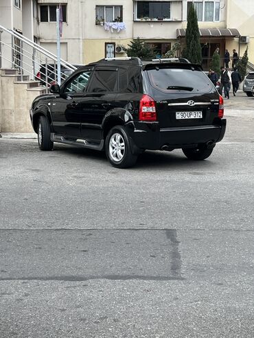 Hyundai: Hyundai Tucson: 2 l | 2005 il Ofrouder/SUV — 1