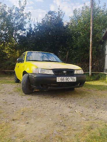 бампер опель вектра б: Daewoo Nexia sedan Xüsusiyyətlər: - Kuzov: 4 qapılı sedan, sarı rəng — 1