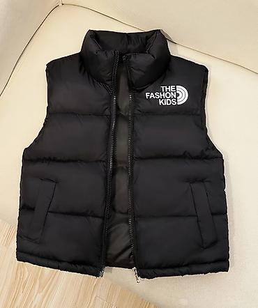 Uşaq üçün qara şişmə jilet - Brend yazısı: “THE FASHION KIDS” (ağ lalafo.az -da Uşaq üçün qara şişmə jilet - Brend yazısı: “THE FASHION KIDS” (ağ