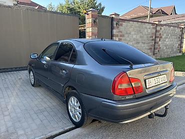 сколько стоит коврик: Mitsubishi Carisma: 2003 г., Механика, Дизель, Седан — 3