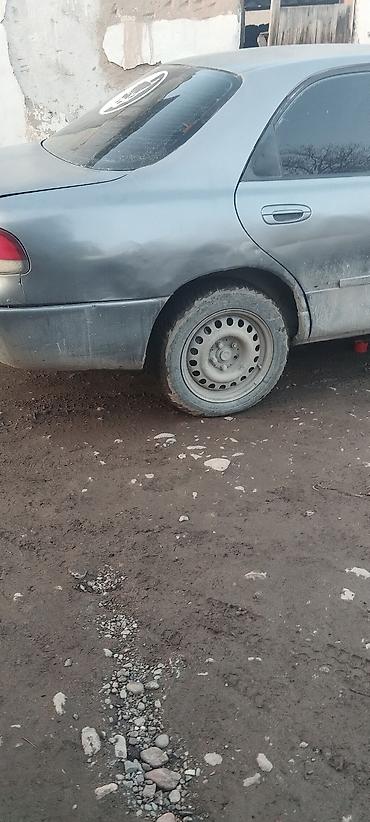 электро машине: Mazda 626: 1993 г., 1.8 л, Механика, Бензин, Седан — 4