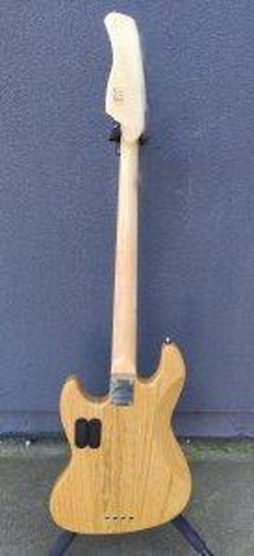 Gitare: SIRE MARCUS MILLER V7 SWAMP ASH 4-STRING FRETLESS B-STOCK | Slanje — 7