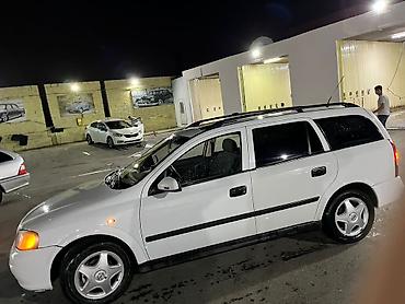 opel astra maşın: Opel Astra Caravan (ağ), universal kuzov - Geniş yük və sərnişin — 5