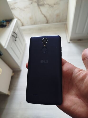 lg l90: LG Gm730 Eigen, 16 ГБ, цвет - Синий, Отпечаток пальца