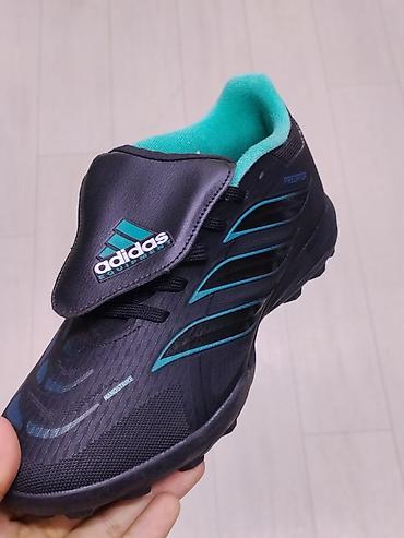 Бутсы: Футбольная бутса Adidas Predator для игры на искусственном — 1