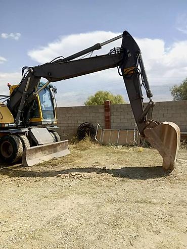 Экскаватор, Volvo, 2004 г., Колесный