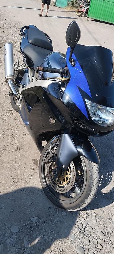 диск 4х100: Kawasaki Ninja, спортивный мотоцикл в фирменной черно-синей окраске — 2
