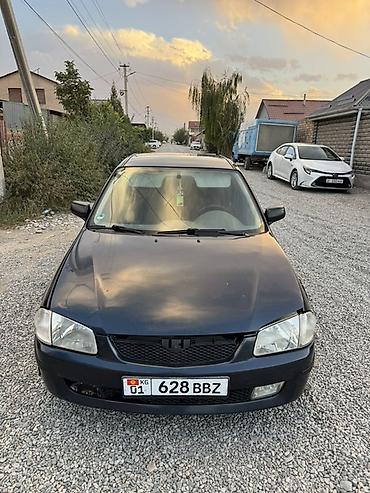 Унаа сатуу: Mazda 323: 1999 г., 1.6 л, Кол менен иштөөчү, Бензин, Седан — 3