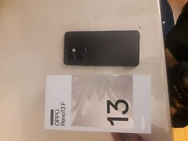 isdenmis telefonlar: Oppo Reno 13 F, 256 GB, rəng - Qara, Barmaq izi — 1