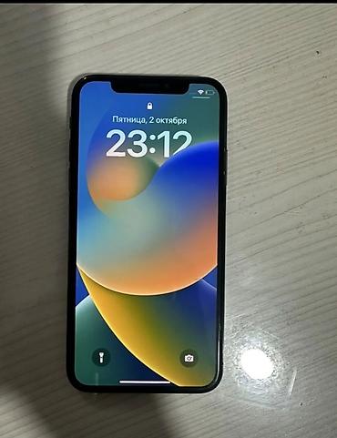 Уюлдук телефондор жана аксессуарлар: IPhone X в черном цвете. Смартфон Apple с узнаваемым безрамочным — 3