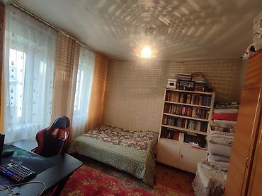 Продажа полдома: Продается пол дома в центре Рабочего Городка. Общий участок 4 сотки — 11