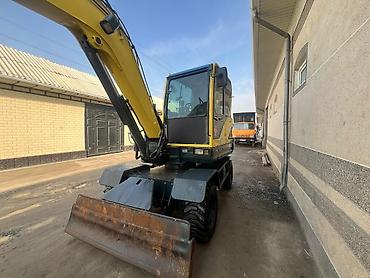 Экскаваторы: Экскаватор, Hyundai, Колесный — 9