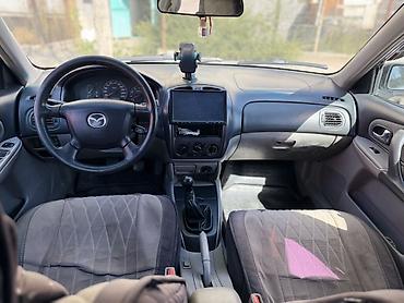 портер 133: Mazda Familia: 2001 г., 1.6 л, Механика, Бензин, Хэтчбэк — 3