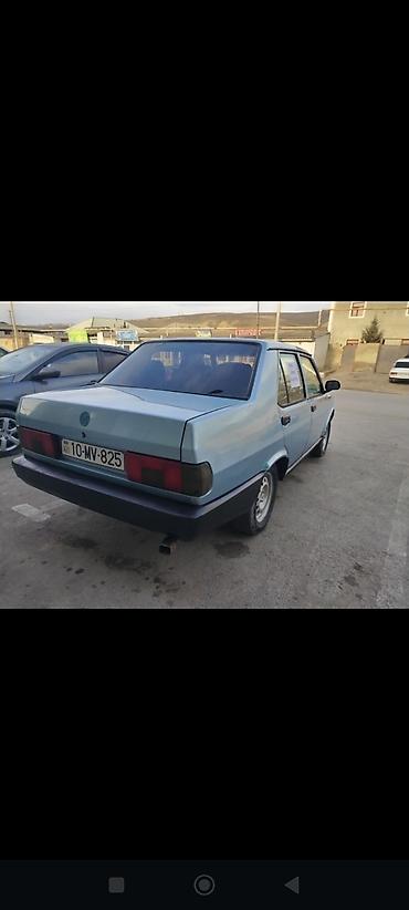 Tofas: Model: Tofaş Doğan (sedan) Rəng: Açıq mavi Kuzov: 4 qapılı, klassik — 3