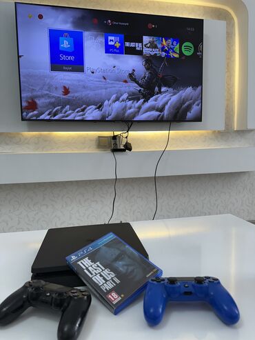 PS4 (Sony Playstation 4): Ps4 slim 1tb 2 orjinal pult ilə + last uf as part 2 diski