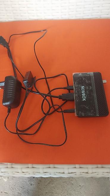 tv box s: NEWBOX rəqəmsal TV qəbuledicisi Xüsusiyyətlər: - Brend/model: NEWBOX — 1