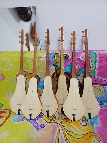 Туюк чабылган өрүк комуздар сатылат. Күүлөп чертип