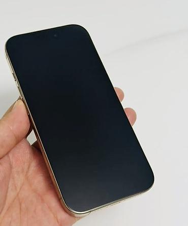 телефон для авто: Смартфон Apple iPhone Pro в золотистом цвете. Корпус выполнен в — 1