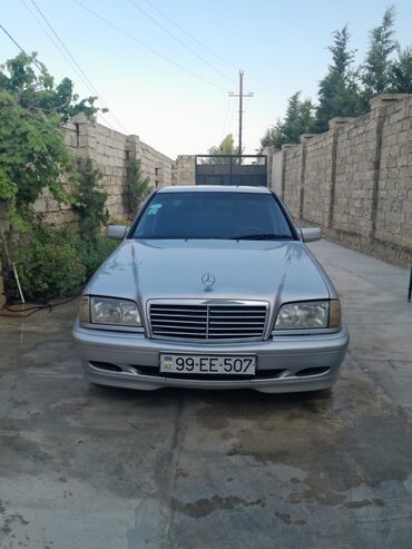 masin ucun ayaqaltilar: Mercedes-Benz 200: 2 l | 2000 il Sedan